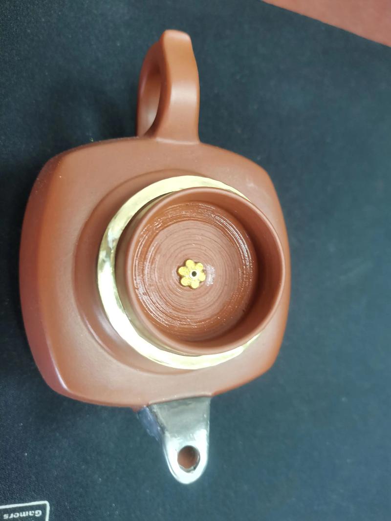 锔紫砂壶铜片怎么包边